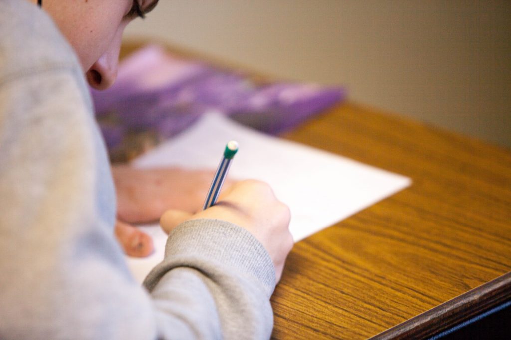 photo of a boy in an exam