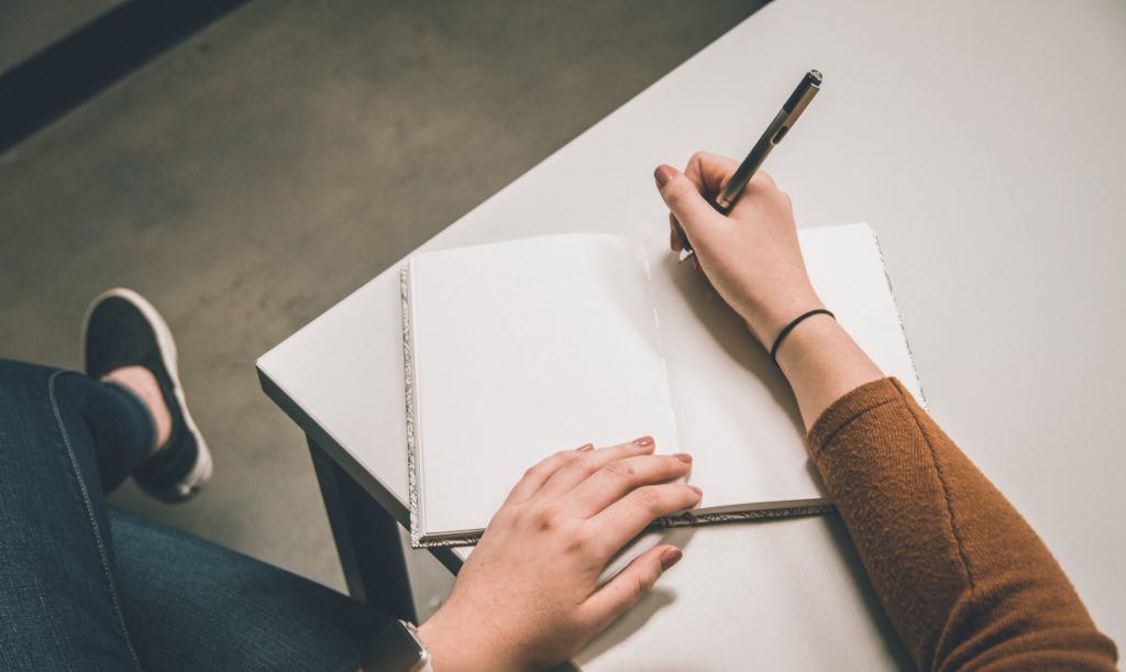 image of a girl writing